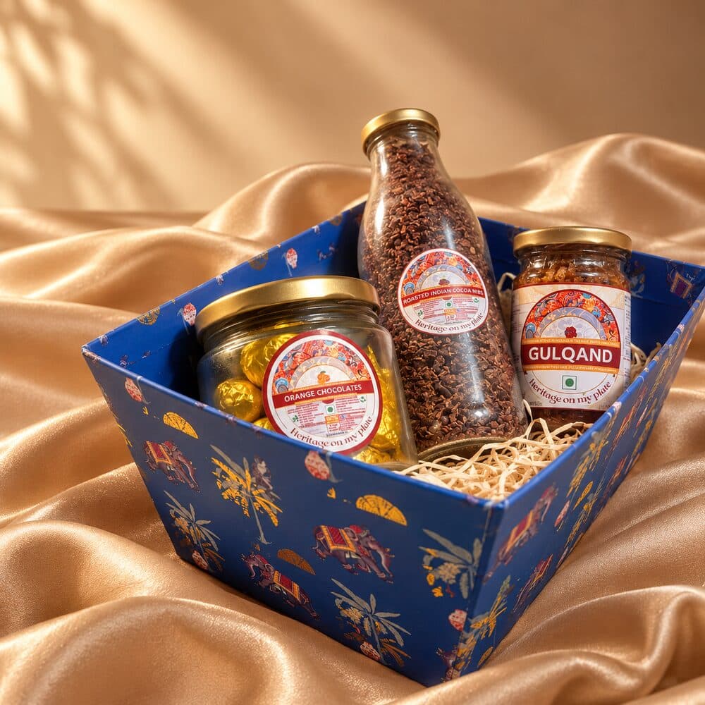 A blue gift tray with orange chocolate, cacao nibs and gulqand